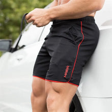 Carregar imagem no visualizador da galeria, Descubra o poder nos treinos com nossos Shorts de Musculação. Confeccionados em poliéster de alta qualidade, proporcionam secagem rápida e máximo conforto. Ideal para quem busca desempenho e estilo nos treinos. Invista em sua performance! 
