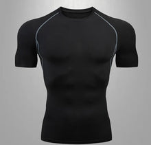 Carregar imagem no visualizador da galeria, Descubra a revolucionária Rash Guard OlimpoFit, mais que uma camiseta de compressão, uma verdadeira armadura para atletas. Suporte anatômico, respirabilidade excepcional e compressão ideal para desafiar seus limites. Ideal para corrida, academia, Jiu-Jitsu e mais. Eleve seu desempenho com a Rash Guard OlimpoFit. Desafie-se, supere barreiras e alcance seus objetivos com confiança. OlimpoFit - Fortalecendo Seu Poder, Definindo Seu Estilo.

