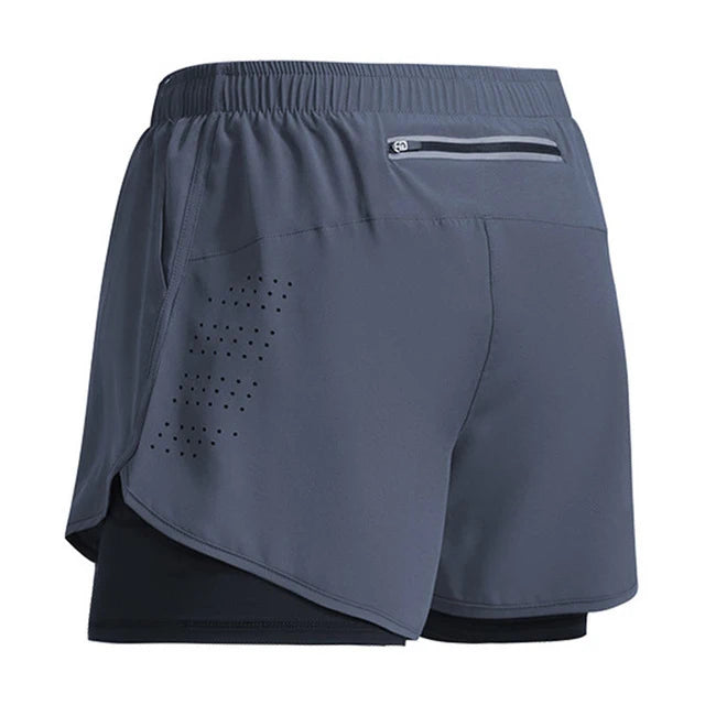 Descubra os Shorts Sportswear Dry Fit 2 em 1, perfeitos para seus treinos e atividades ao ar livre. Feitos de poliéster de secagem rápida, proporcionam conforto e versatilidade. Ideal para corridas, academia e mais. Encontre seu par na OlimpoFit.