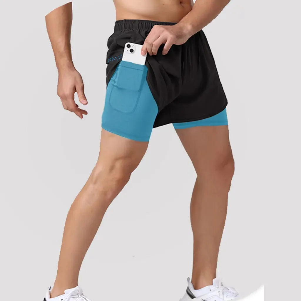 Descubra os Shorts Sportswear Dry Fit 2 em 1, perfeitos para seus treinos e atividades ao ar livre. Feitos de poliéster de secagem rápida, proporcionam conforto e versatilidade. Ideal para corridas, academia e mais. Encontre seu par na OlimpoFit.