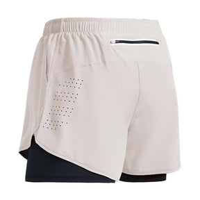 Descubra os Shorts Sportswear Dry Fit 2 em 1, perfeitos para seus treinos e atividades ao ar livre. Feitos de poliéster de secagem rápida, proporcionam conforto e versatilidade. Ideal para corridas, academia e mais. Encontre seu par na OlimpoFit.