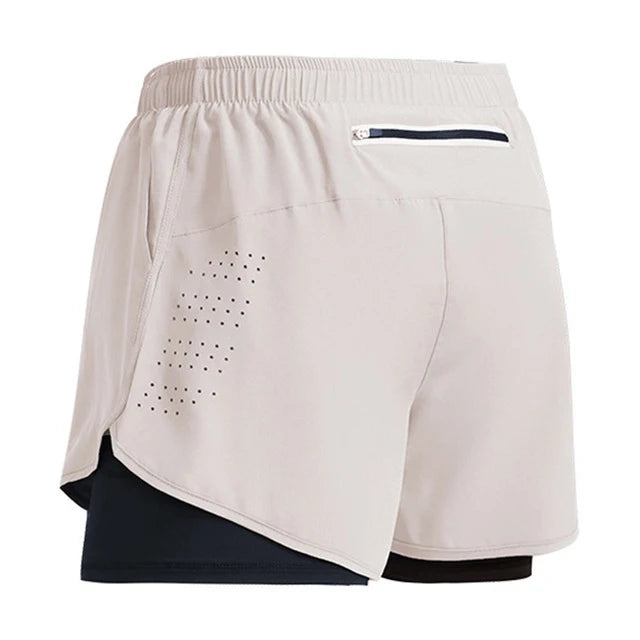 Descubra os Shorts Sportswear Dry Fit 2 em 1, perfeitos para seus treinos e atividades ao ar livre. Feitos de poliéster de secagem rápida, proporcionam conforto e versatilidade. Ideal para corridas, academia e mais. Encontre seu par na OlimpoFit.