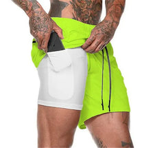 Carregar imagem no visualizador da galeria, Descubra o conforto e a versatilidade do OlimpoRun, um shorts de corrida Dry Fit 2 em 1, perfeito para treinos intensos na academia e atividades ao ar livre. Tecnologia de secagem rápida, ajuste perfeito e estilo único para elevar sua performance fitness. Escolha a moda ativa e supere limites com OlimpoRun!

